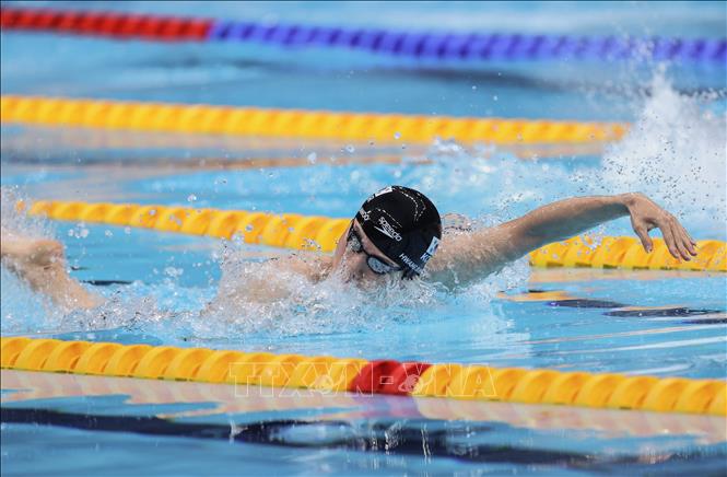 Trong ảnh: Vận động viên bơi Hàn Quốc Hwang Sun-woo hoàn thành bài bơi tự do 200m dành cho nam tại Olympic Tokyo 2020, ngày 26/7/2021. Ảnh: YONHAP/TTXVN