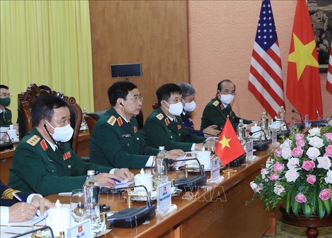 Photo: Minister of National Defence Gen. Phan Van Giang attends the talks with US Secretary of Defense Lloyd Austin. VNA Photo: Trọng Đức