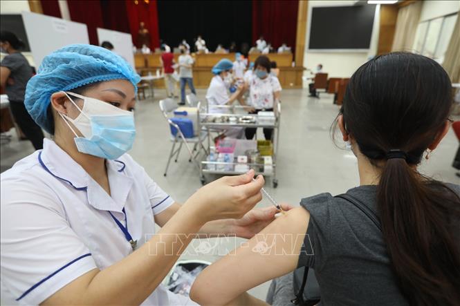 Photo: A COVID-19 vaccination campaign for over 5 million people is underway in Hanoi. VNA Photo: Bui Cuong Quyet