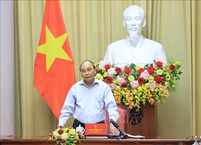 Trong ảnh: Chủ tịch nước Nguyễn Xuân Phúc phát biểu tại buổi gặp mặt. Ảnh: Thống Nhất - TTXVN