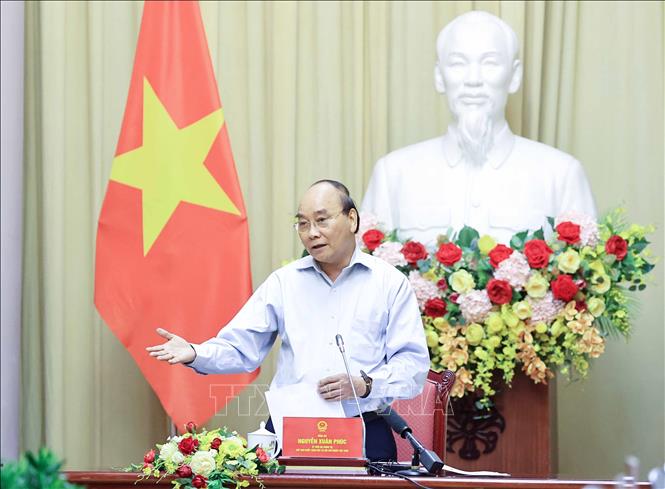 Trong ảnh: Chủ tịch nước Nguyễn Xuân Phúc phát biểu tại buổi gặp mặt. Ảnh: Thống Nhất - TTXVN