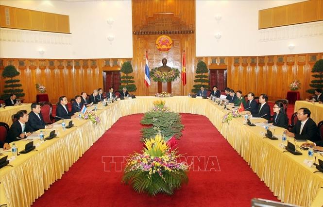 Trong ảnh: Thủ tướng Nguyễn Tấn Dũng hội đàm với Thủ tướng Vương quốc Thái Lan Prayuth Chan-ocha trong chuyến thăm Việt Nam từ ngày 27-28/11/2014. Ảnh: Đức Tám-TTXVN