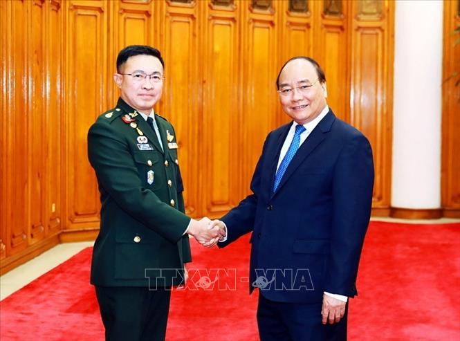 Trong ảnh:Thủ tướng Nguyễn Xuân Phúc tiếp Đại tướng Surapong Suwana Adth, Tư lệnh lực lượng Quốc phòng Quân đội Hoàng gia Thái Lan đang thăm chính thức Việt Nam. Ảnh: Thống Nhất – TTXVN