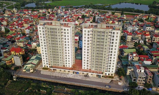 Dự án xây dựng nhà ở tái định cư tại ô đất ký hiệu C13/DD1 nằm tại ngõ 22 Khuyến Lương, phường Trần Phú, quận Hoàng Mai sẽ được trưng dụng làm nơi điều trị bệnh nhân mắc COVID-19 không triệu chứng hoặc triệu chứng nhẹ. Ảnh: Thành Đạt - TTXVN 
