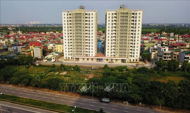 Vị trí của 2 tòa nhà tái định cư tại ô đất ký hiệu C13/DD1, phường Trần Phú, quận Hoàng Mai gần đường Vành đai 3 sẽ được trưng dụng làm nơi điều trị bệnh nhân COVID-19 không triệu chứng hoặc triệu chứng nhẹ. Ảnh: Thành Đạt - TTXVN 