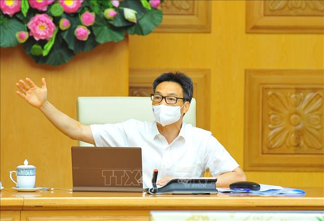 Trong ảnh: Phó Thủ tướng Chính phủ Vũ Đức Đam, Trưởng Ban Chỉ đạo Quốc gia phòng, chống COVID-19 chủ trì cuộc họp. Ảnh: Minh Đức – TTXVN
