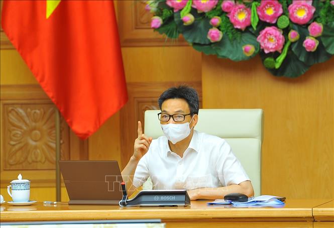 Trong ảnh: Phó Thủ tướng Chính phủ Vũ Đức Đam, Trưởng Ban Chỉ đạo Quốc gia phòng, chống COVID-19 chủ trì cuộc họp. Ảnh: Minh Đức – TTXVN