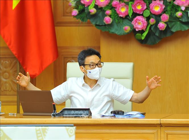 Trong ảnh: Phó Thủ tướng Chính phủ Vũ Đức Đam, Trưởng Ban Chỉ đạo Quốc gia phòng, chống COVID-19 chủ trì cuộc họp. Ảnh: Minh Đức – TTXVN