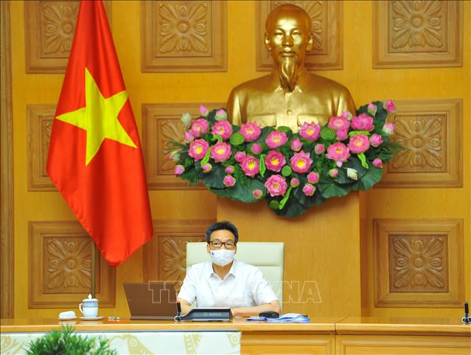 Trong ảnh: Phó Thủ tướng Chính phủ Vũ Đức Đam, Trưởng Ban Chỉ đạo Quốc gia phòng, chống COVID-19 chủ trì cuộc họp. Ảnh: Minh Đức – TTXVN