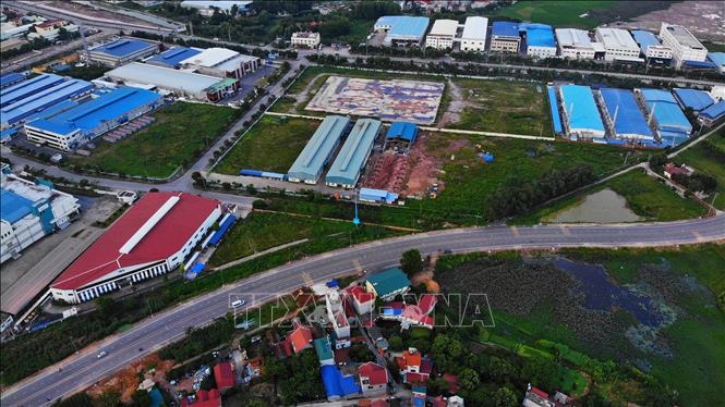 Trong ảnh: Dự án xây dựng tuyến đường nối QL17-QL.37 đoạn qua khu đô thị Nội Hoàng, huyện Yên Dũng(Bắc Giang) đã hoàn thành vào tháng 7/2021. Ảnh: Danh Lam-TTXVN
