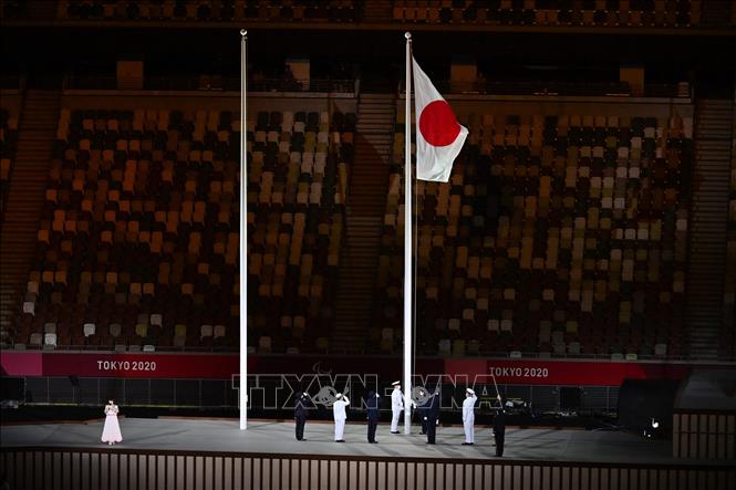 Trong ảnh: Lễ thượng cờ Nhật Bản tại lễ khai mạc Paralympic Tokyo 2020 ở thủ đô Tokyo, Nhật Bản, ngày 24/8/2021. Ảnh: AFP/ TTXVN