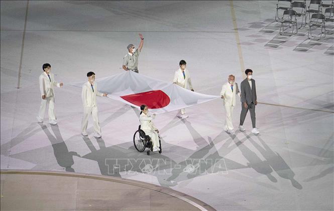 Trong ảnh: Lễ thượng cờ Nhật Bản tại Lễ khai mạc Paralympic Tokyo 2020 ở Tokyo, Nhật Bản, ngày 24/8/2021. Ảnh: THX/ TTXVN