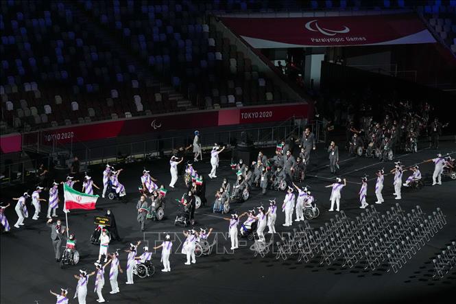 Trong ảnh: Đoàn thể thao Iran diễu hành tại Lễ khai mạc Paralympic Tokyo 2020 ở Tokyo, Nhật Bản, ngày 24/8/2021. Ảnh: THX/ TTXVN