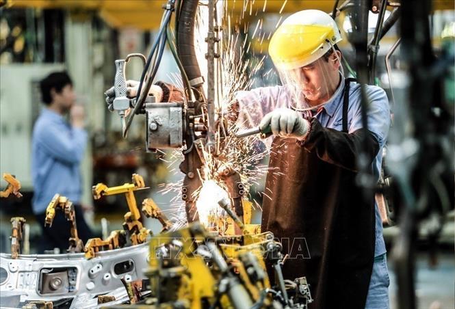 Trong ảnh: Dây chuyền hàn khung xe ô tô tại Công ty ô tô Toyota Việt Nam, vốn đầu tư của Nhật Bản tại Vĩnh Phúc. Ảnh: Danh Lam - TTXVN