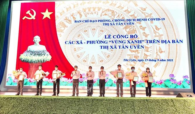 Thị xã Tân Uyên (Bình Dương) công bố 6 phường, xã chuyển hóa thành “vùng xanh”. Ảnh: TTXVN 