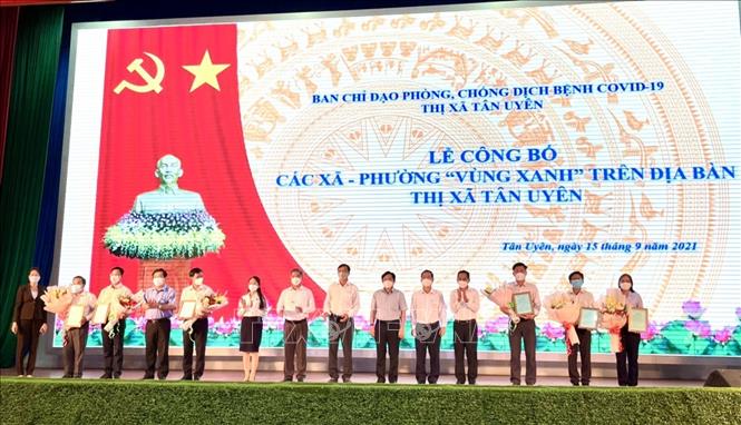 Thị xã Tân Uyên (Bình Dương) công bố 6 phường, xã chuyển hóa thành “vùng xanh”. Ảnh: TTXVN  