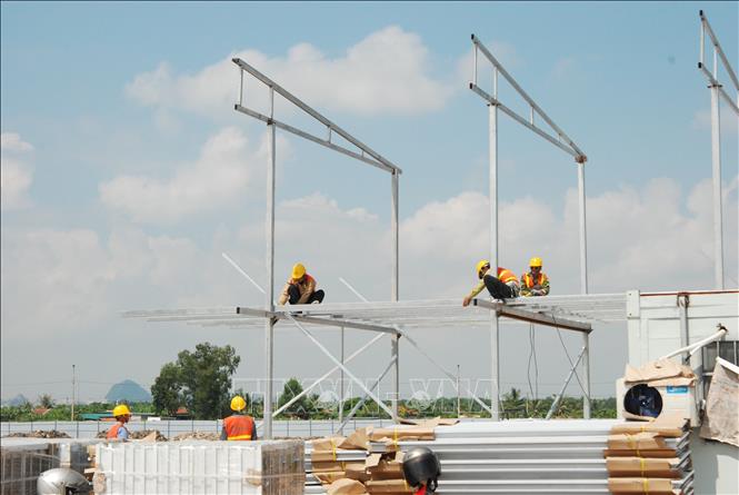 Photo: At the construction site of the project in Song Khoai industrial park in Quang Yen township. VNA Photo: Thanh Vân
