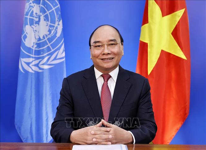 Photo: President Nguyen Xuan Phuc attends the online summit. VNA Photo: Thống Nhất