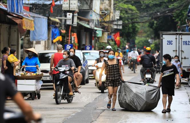 Trong ảnh: Cuộc sống dần ổn định với người dân. Ảnh: Thành Đạt - TTXVN