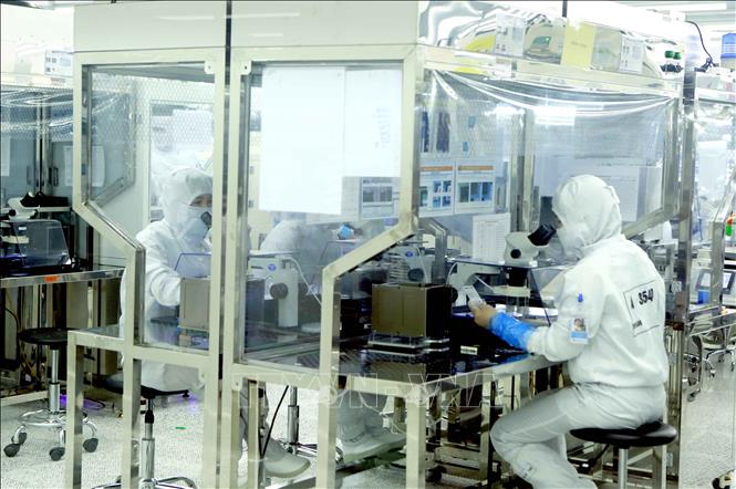 Photo: A production line of the Optrontec Vina Co. Ltd. in the Binh Xuyen IP. VNA Photo: Hoàng Hùng