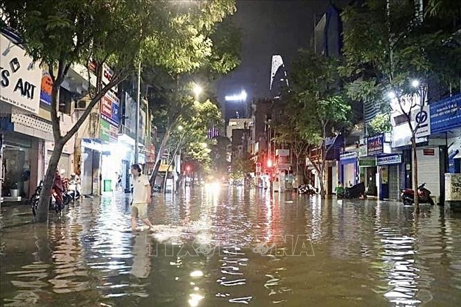 Ngập nặng trên tuyến đường Nguyễn Công Trứ - Calmette (Quận 1). Ảnh: Hồng Giang - TTXVN