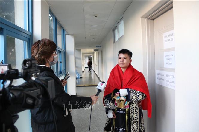 Photo: Thu Nhi (R) in an interview given to VNA after her historical triumph. VNA Photo: Mạnh Hùng