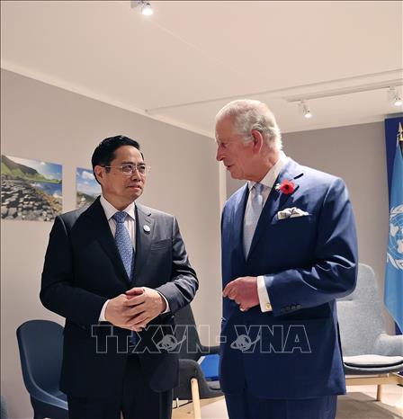 Trong ảnh: Thủ tướng Phạm Minh Chính gặp Thái tử Vương Quốc Anh Charles Philip Arthur George. Ảnh: Dương Giang-TTXVN
