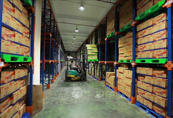 Trong ảnh: Kho thành phẩm Nhà máy Richy miền Bắc. Ảnh: Vũ Sinh – TTXVN