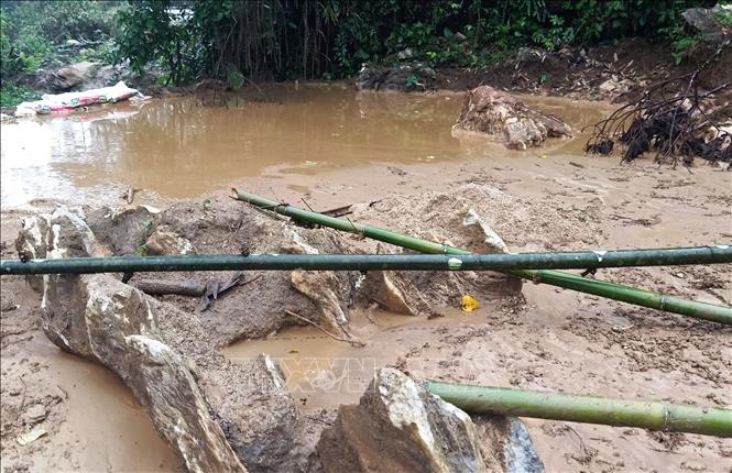 Trong ảnh: Một trong những điểm khai thác khoáng sản trái phép trên địa bàn xã An Phú. Ảnh: Tuấn Anh - TTXVN
