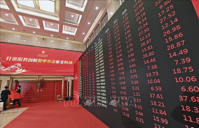 Trong ảnh: Lễ khai trương sàn giao dịch chứng khoán Bắc Kinh (Trung Quốc) ngày 15/11/2021. Ảnh: THX/TTXVN