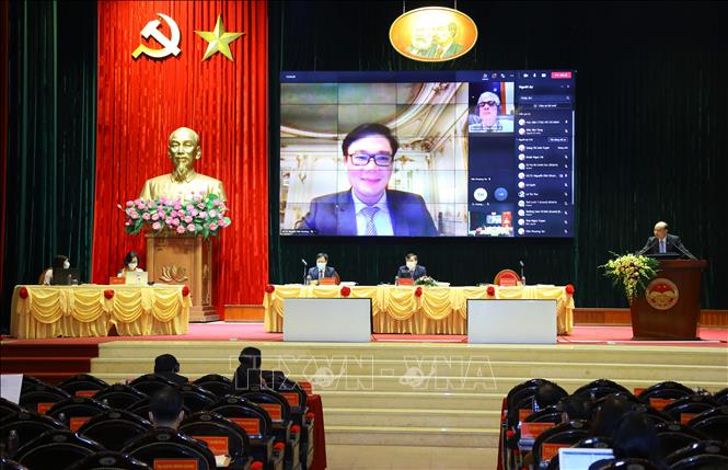 Quang cảnh Hội thảo tại điểm cầu Hà Nội. Ảnh: Văn Điệp - TTXVN