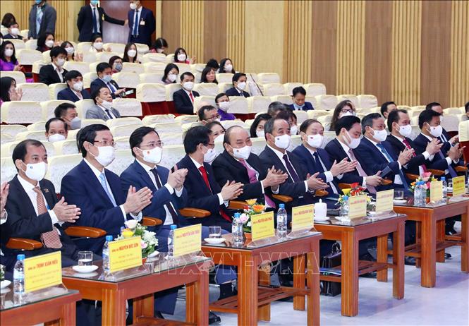 Trong ảnh: Chủ tịch nước Nguyễn Xuân Phúc và các đại biểu tham dự buổi lễ. Ảnh: Phạm Kiên - TTXVN