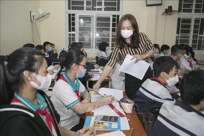 Trong ảnh: Giờ học của học sinh trường THCS Nghi Ân, thành phố Vinh. Ảnh: TTXVN