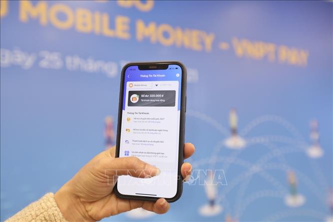 Trong ảnh: VNPT chính thức công bố cung cấp dịch vụ Mobile Money trên cả nước. Ảnh: Minh Quyết - TTXVN