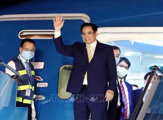 Trong ảnh: Thủ tướng Phạm Minh Chính về tới sân bay quốc tế Nội Bài (Hà Nội). Ảnh: Phạm Kiên – TTXVN
