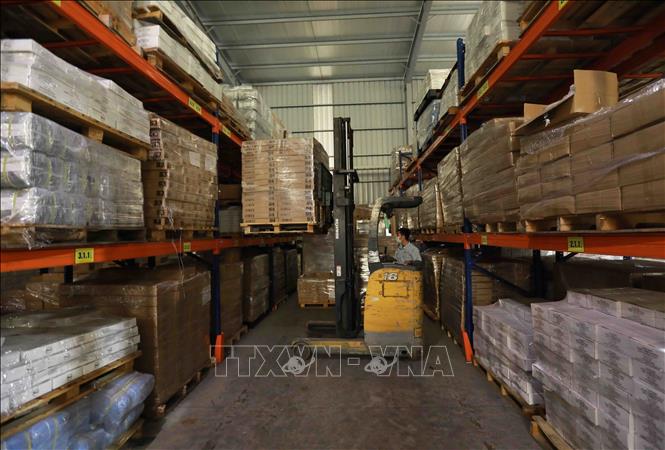 Trong ảnh: Sản phẩm của Công ty Cổ phần HAPLAST được bảo quản đúng quy trình tại kho hàng trước khi xuất khẩu. Ảnh: Vũ Sinh - TTXVN