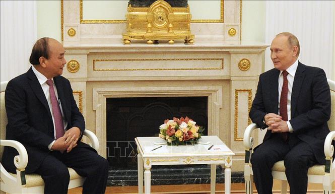 Chủ tịch nước Nguyễn Xuân Phúc hội đàm với Tổng thống Nga Vladimir Putin. Ảnh: TTXVN