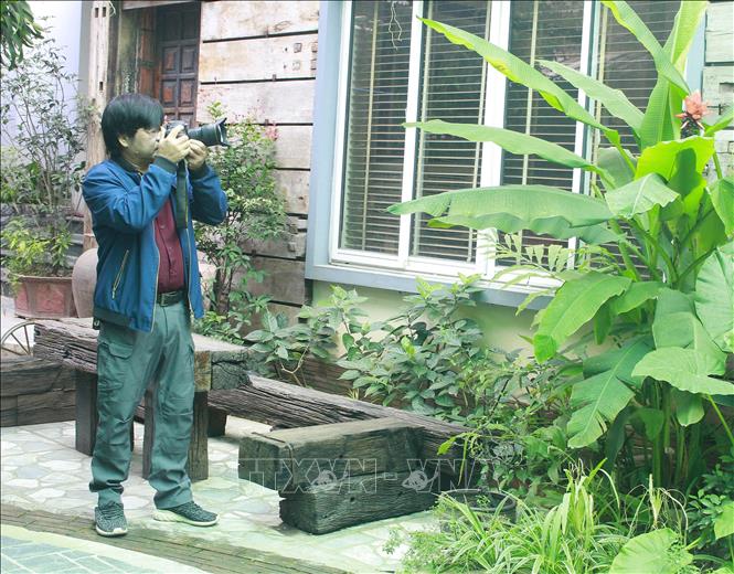 Trong ảnh: Trong 2 năm 2020 và 2021, nghệ sỹ nhiếp ảnh Dương Duy Khang (tỉnh Ninh Bình) đã giành được hơn 10 huy chương tại các cuộc thi ảnh quốc tế. Ảnh: Thùy Dung - TTXVN