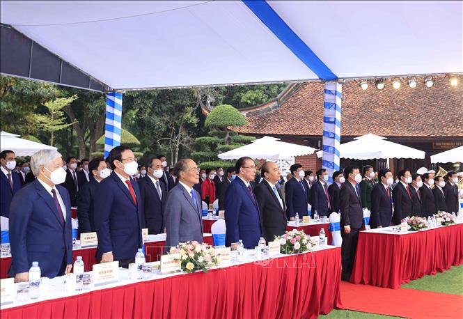Trong ảnh: Chủ tịch nước Nguyễn Xuân Phúc, các đồng chí lãnh đạo, nguyên Đảng, Nhà nước dự Lễ kỷ niệm. Ảnh: Thống Nhất- TTXVN