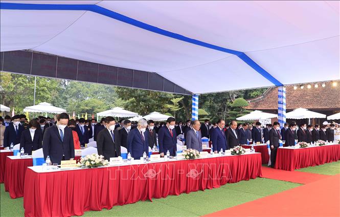 Trong ảnh: Chủ tịch nước Nguyễn Xuân Phúc, các đồng chí lãnh đạo, nguyên Đảng, Nhà nước dự Lễ kỷ niệm. Ảnh: Thống Nhất- TTXVN