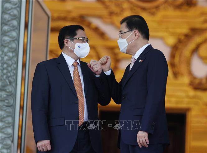 Trong ảnh: Thủ tướng Phạm Minh Chính tiếp Bộ trưởng Bộ Ngoại giao Hàn Quốc Chung Eui Yong sang thăm chính thức Việt Nam, chiều 23/6/2021. Ảnh: Dương Giang-TTXVN