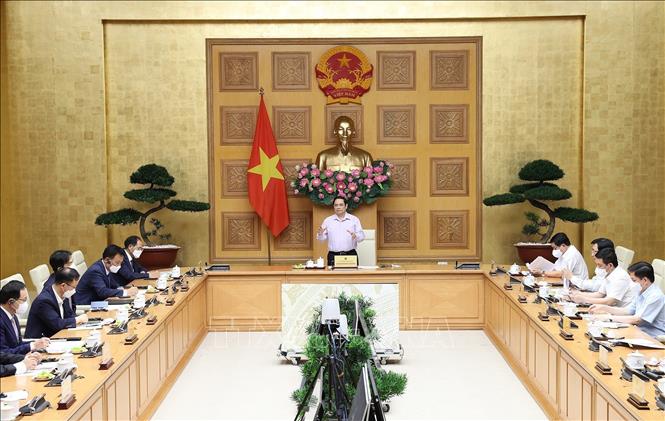 Trong ảnh: Thủ tướng Phạm Minh Chính làm việc với Đại sứ, đại diện một số tổ chức, hiệp hội doanh nghiệp Hàn Quốc tại Việt Nam để bàn giải pháp tháo gỡ khó khăn, thúc đẩy sản xuất, đầu tư, kinh doanh cho các doanh nghiệp trong bối cảnh dịch bệnh COVID-19. Ảnh: Dương Giang-TTXVN
