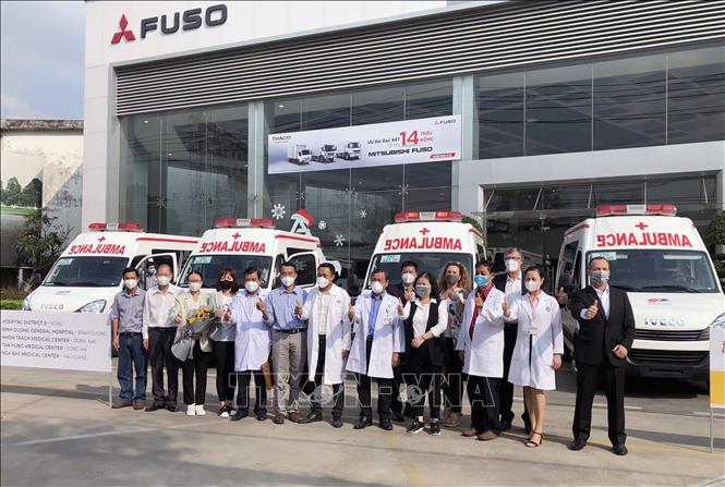 Photo: A view of the ceremony to hand over the ambulances to Ho Chi Minh City and the southern provinces of Binh Duong, Dong Nai, Long An and Hau Giang. VNA Photo: Mỹ Phương