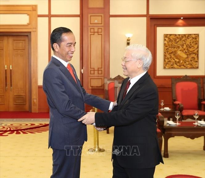 Trong ảnh: Tổng Bí thư Nguyễn Phú Trọng tiếp Tổng thống Cộng hòa Indonesia Joko Widodo thăm cấp Nhà nước Việt Nam và tham dự Hội nghị Diễn đàn Kinh tế thế giới về ASEAN 2018 (12/9/2018). Ảnh: Trí Dũng – TTXVN