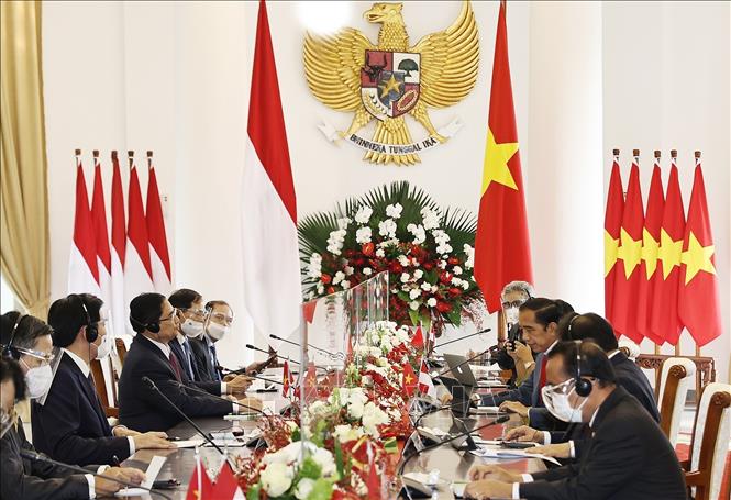 Trong ảnh: Trước thềm Hội nghị các Nhà Lãnh đạo ASEAN, chiều 23/4/2021, tại Jakarta, Thủ tướng Chính phủ Phạm Minh Chính đến chào xã giao Tổng thống Indonesia Joko Widodo. Ảnh: Dương Giang – TTXVN