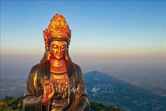Photo: The Da Son Tay Bon Buddha is also known as the Lady Buddha on the top of Ba Den mountain or the tallest bronze Buddha statue in Asia. VNA Photo: Thanh Tân