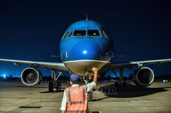 Photo: Vietnam Airlines’ plane lands at Tan Son Nhat International Airport. VNA Photo