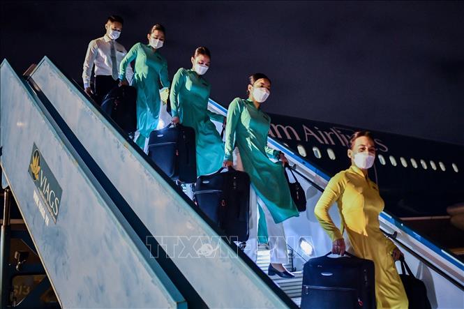 Photo: Vietnam Airlines’ plane lands at Tan Son Nhat International Airport. VNA Photo