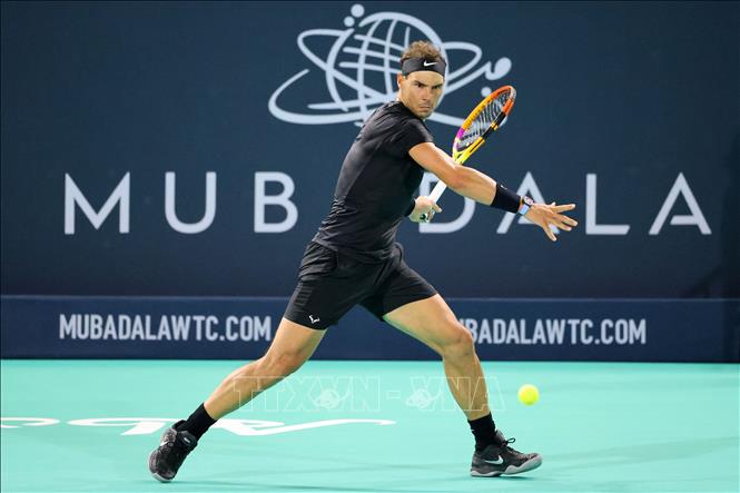 Trong ảnh: Tay vợt Rafael Nadal thi đấu tại Giải vô địch quần vợt thế giới Mubadala ở Abu Dhabi, UAE ngày 18/12/2021. Ảnh: AFP/TTXVN
