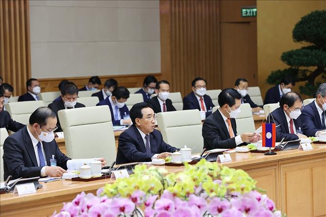 Trong ảnh: Thủ tướng Lào Phankham Viphavanh phát biểu tại cuộc họp. Ảnh: Dương Giang-TTXVN 